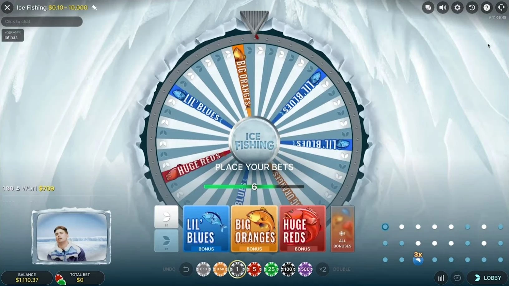 Ice Fishing game interface showing the 53-segment wheel, betting panel, and Arctic theme